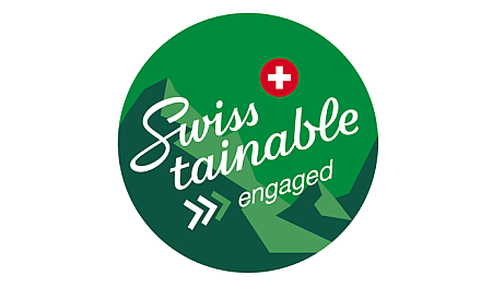 Logo for Swiss sustainability commitment featuring mountain motifs.