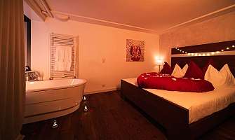 Chambre romantique avec baignoire